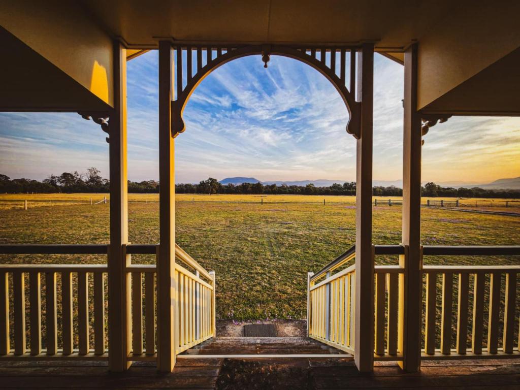 a view of a field from a gazebo at Willow Lodge 