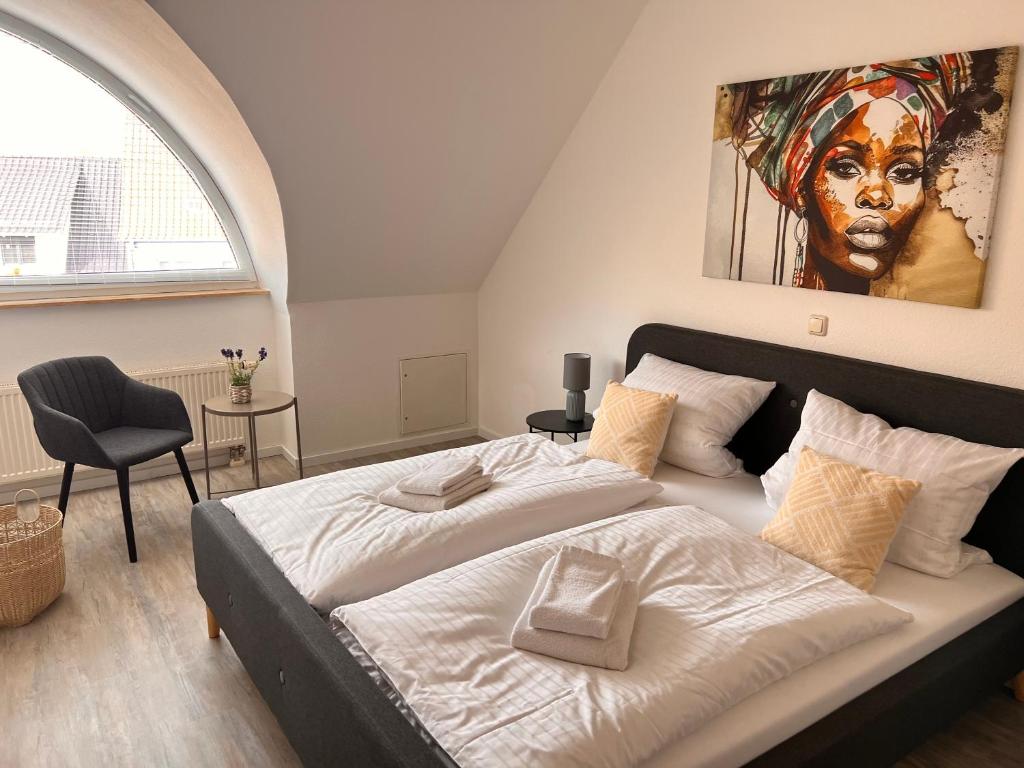 Ένα ή περισσότερα κρεβάτια σε δωμάτιο στο Livoro Apartments