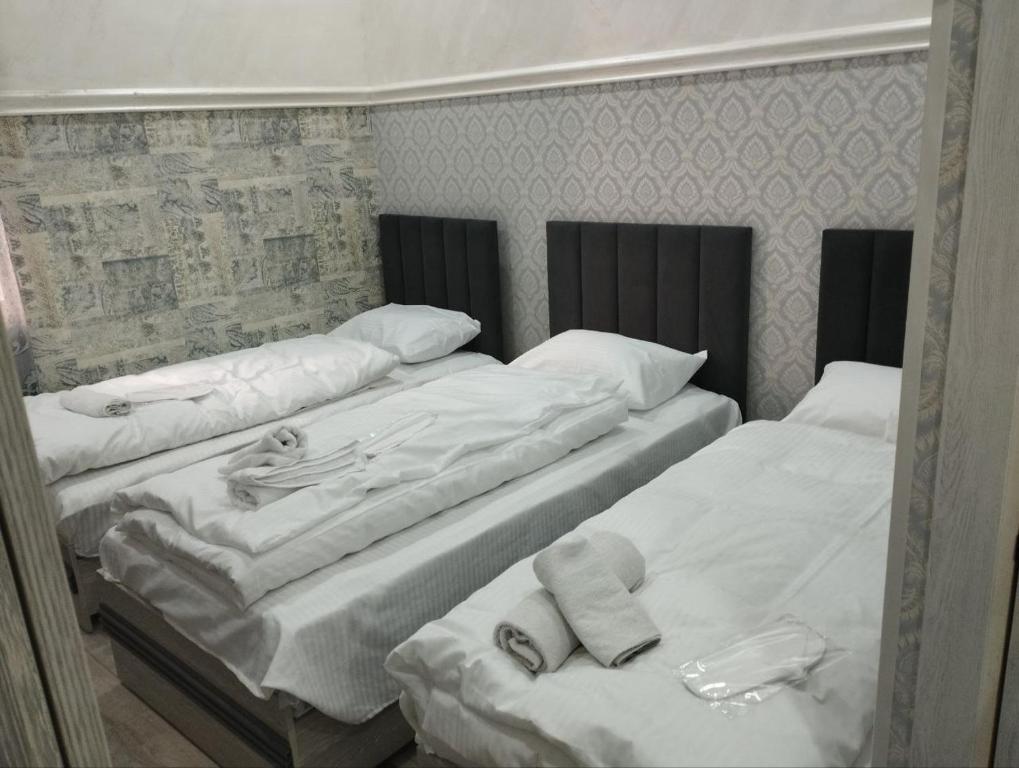 Postel nebo postele na pokoji v ubytování Minor Hotel