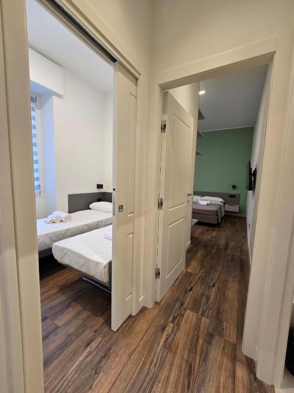 Ένα ή περισσότερα κρεβάτια σε δωμάτιο στο VeronaVera Orlandi