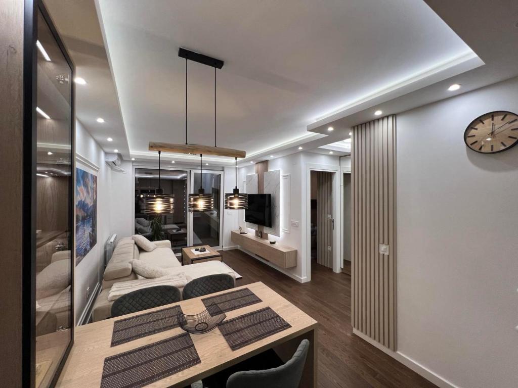 TV a/nebo společenská místnost v ubytování Impresia apartments 2