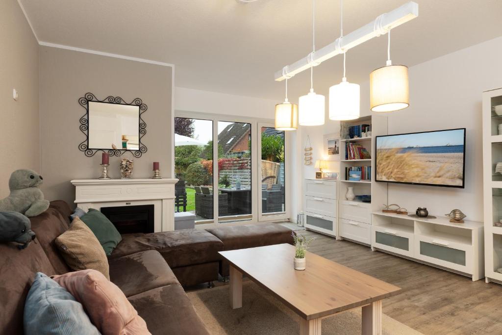 TV a/nebo společenská místnost v ubytování OstseeRobbe