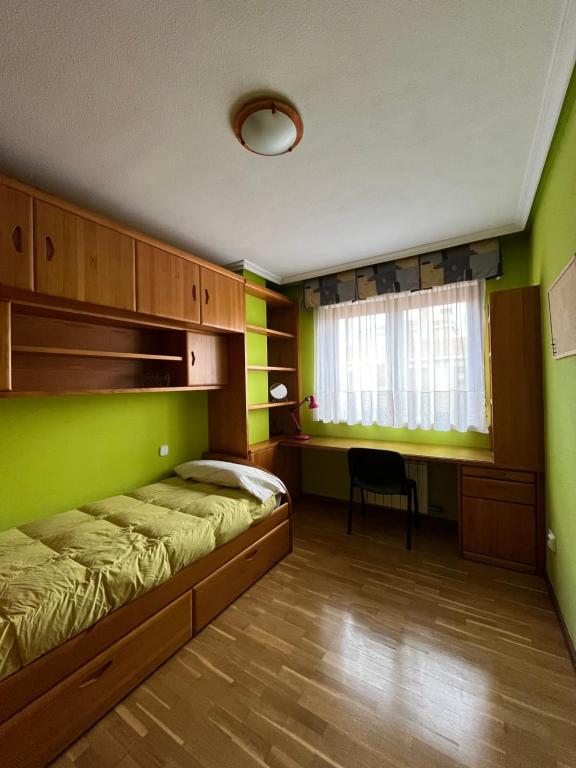 Postel nebo postele na pokoji v ubytování Casa Juanjo