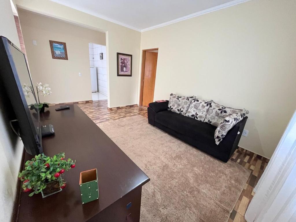 Et tv og/eller underholdning på Apartmento - Poços de Caldas