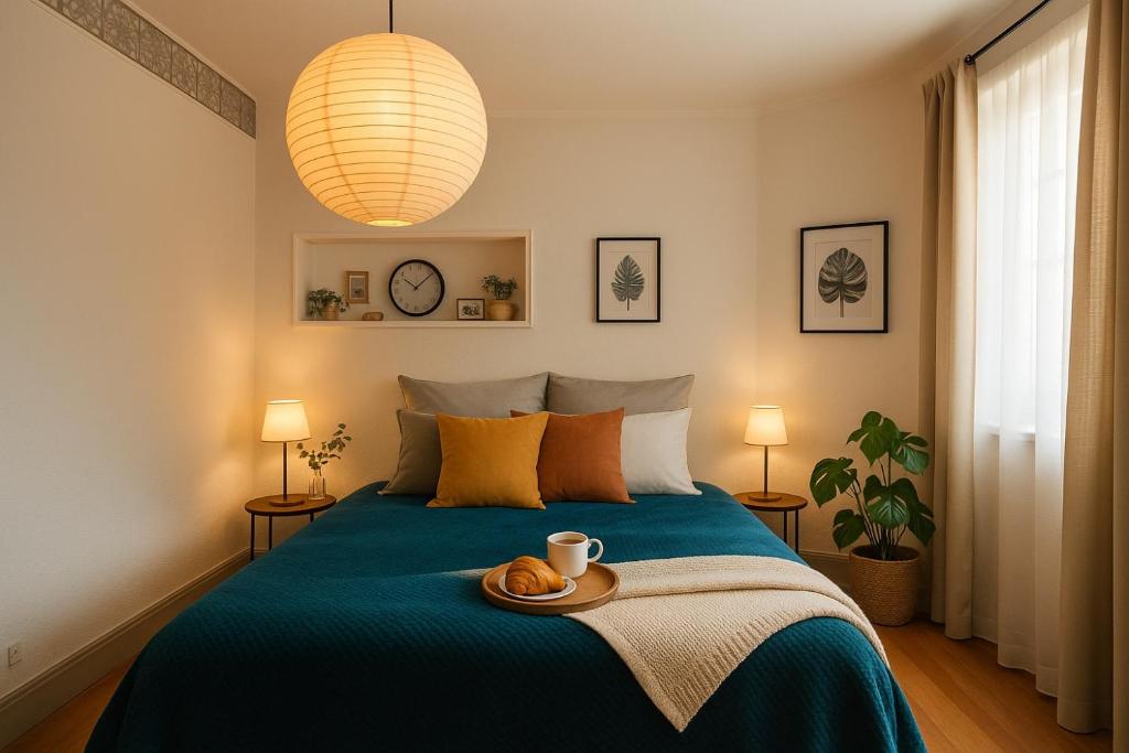 a bedroom with a bed with a plate on it at Vivez un conte de fée dans la pièce ronde d'une tour médiévale in Porrentruy