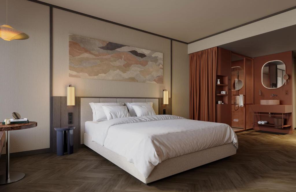 Ένα ή περισσότερα κρεβάτια σε δωμάτιο στο Hotel Schani City