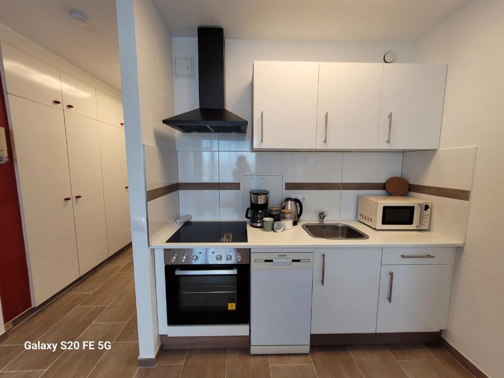 Kuchyň nebo kuchyňský kout v ubytování 3-Zimmer Wohnung in Centrum