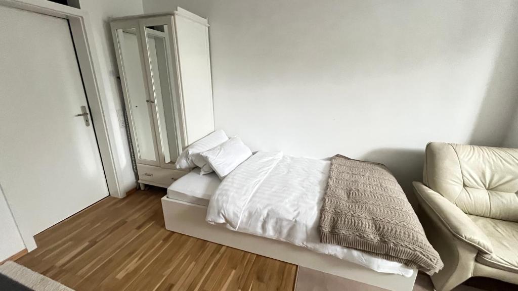 Postel nebo postele na pokoji v ubytování Baadenberger stay D