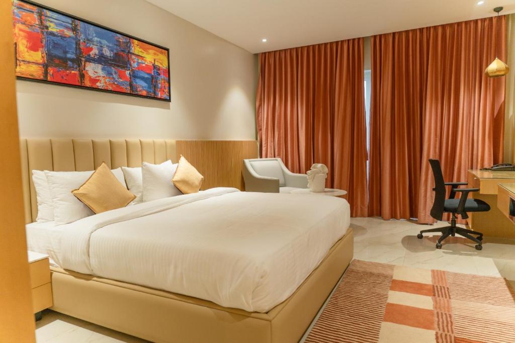 Postel nebo postele na pokoji v ubytování Golden Sands - By The Bay Resorts