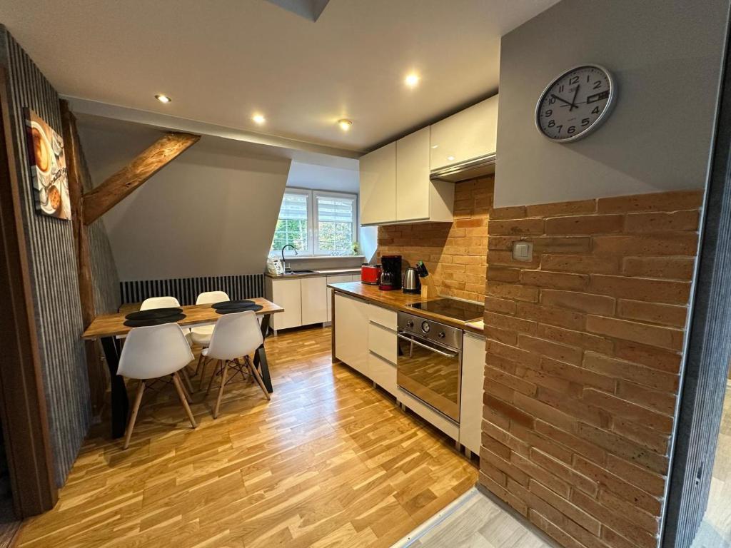 Kuchyň nebo kuchyňský kout v ubytování Apartament Familijny