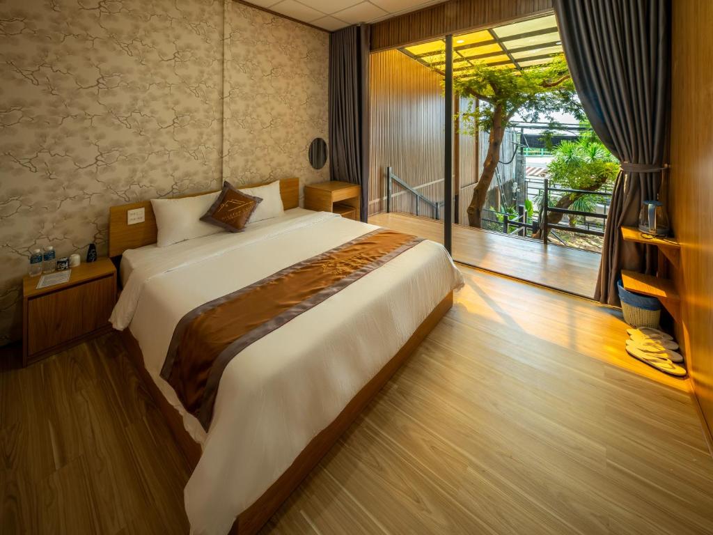 Ένα ή περισσότερα κρεβάτια σε δωμάτιο στο Hilltop Chill Homestay Mui Ne