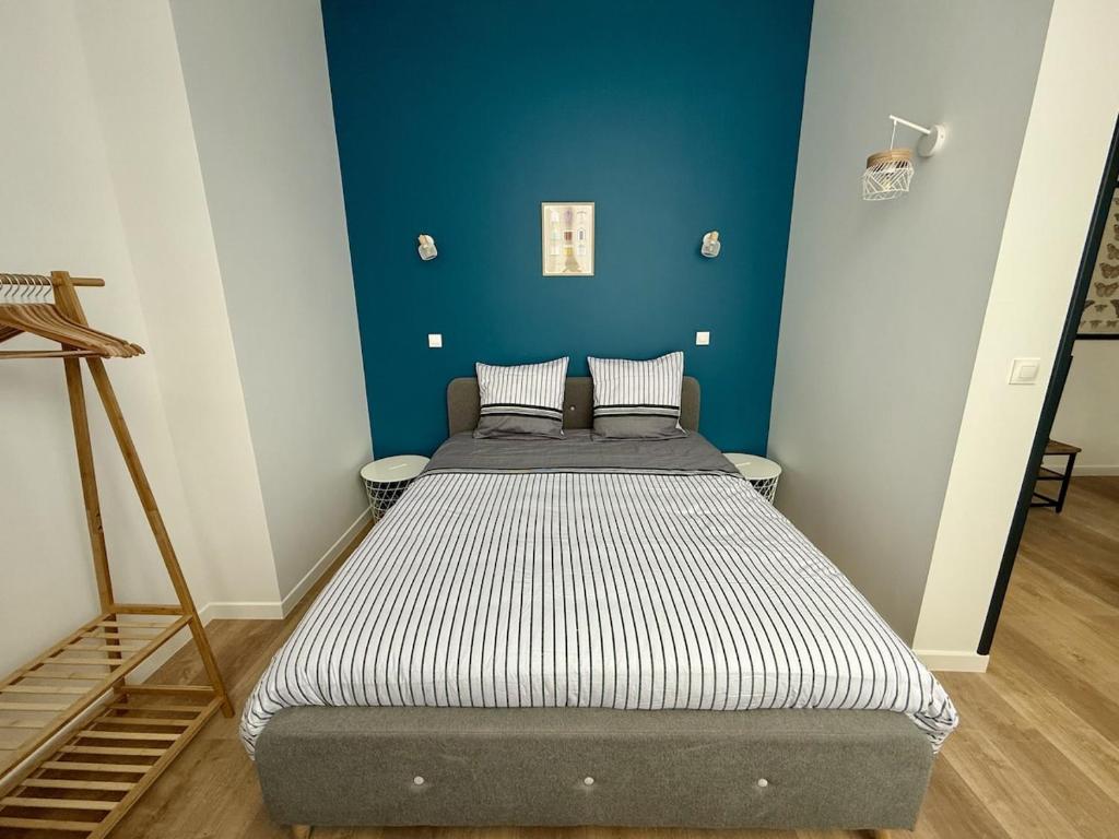 Ένα ή περισσότερα κρεβάτια σε δωμάτιο στο Le Calais Wilson 1, 4 pers