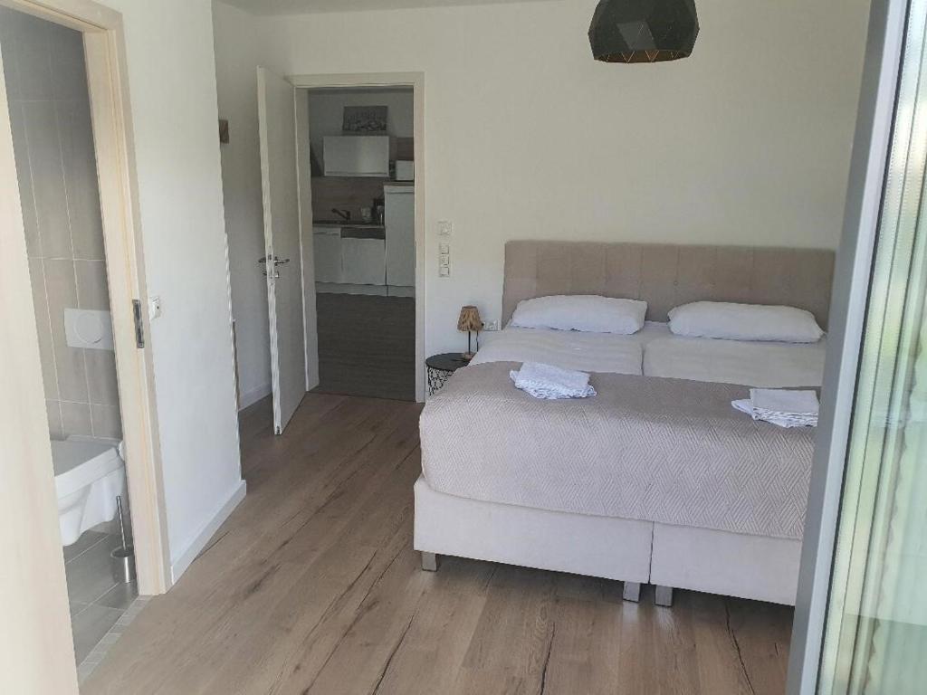 Postel nebo postele na pokoji v ubytování Zimmervermietung Voth