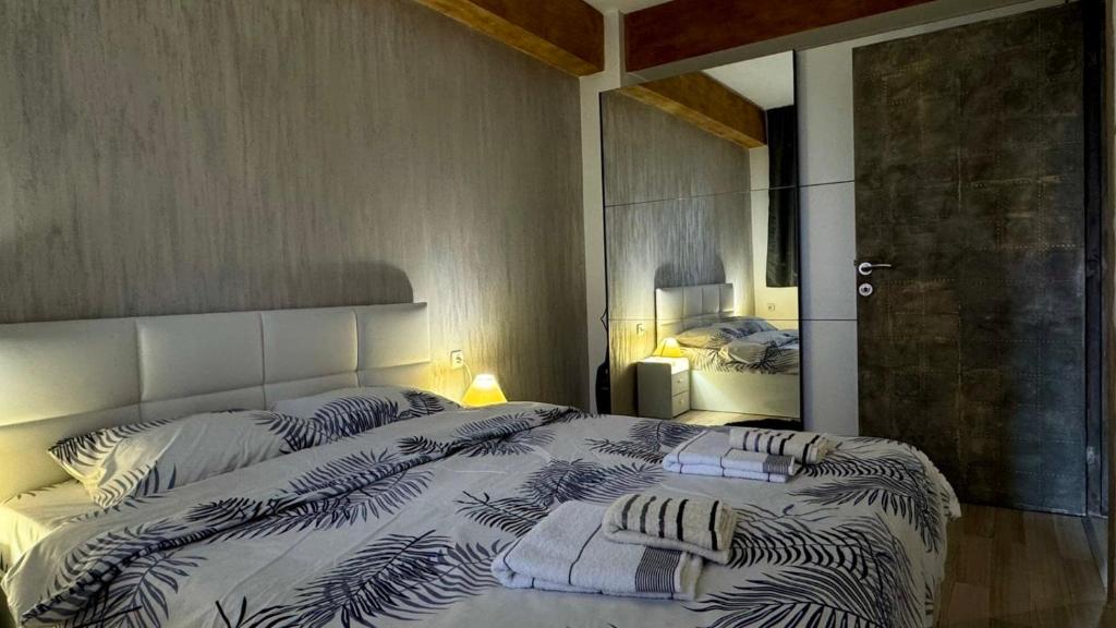 Postel nebo postele na pokoji v ubytování Dinjas place