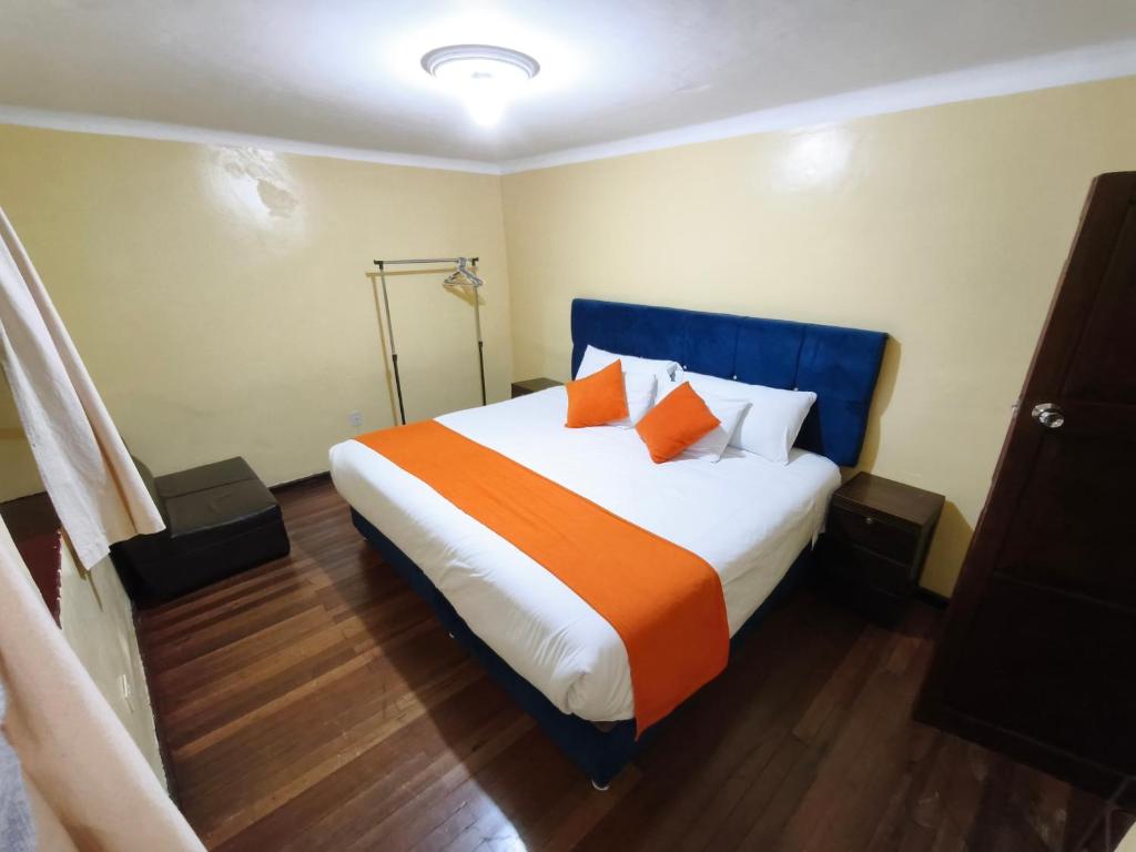 Ένα ή περισσότερα κρεβάτια σε δωμάτιο στο Qosqo Apartments 3