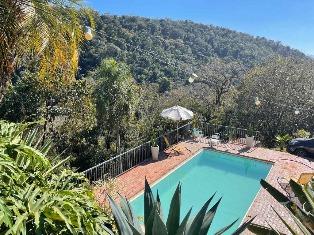 Πισίνα στο ή κοντά στο Casa em Mairinque com Piscina e Área Verde