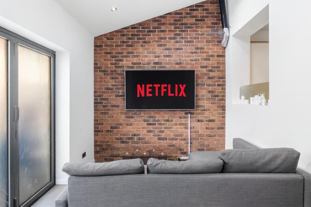 Posezení v ubytování Maison Hammoud, Luxury Rooms in Wembley