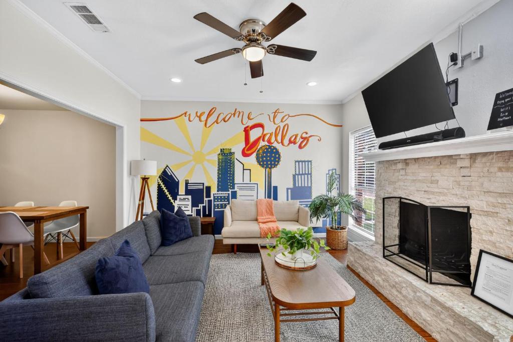 a living room with a couch and a fireplace at Vibrant 3BR Dallas Home, Near DFW, With Family-Friendly Amenities in Irving