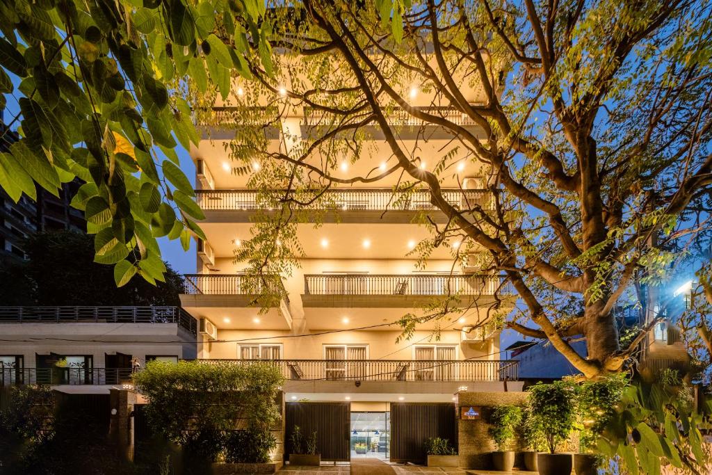 a building with lights on the side of it at Royal Studio Golf Course Road in Gurgaon