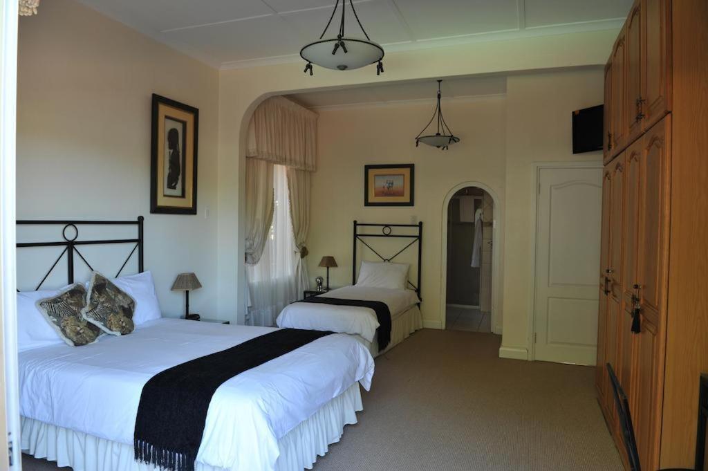 Postel nebo postele na pokoji v ubytování Zoprys Guest House 2