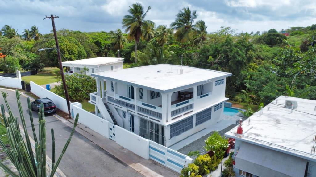 an aerial view of a white house at Casa Anastasia Beachside Villa with Pool in Vieques
