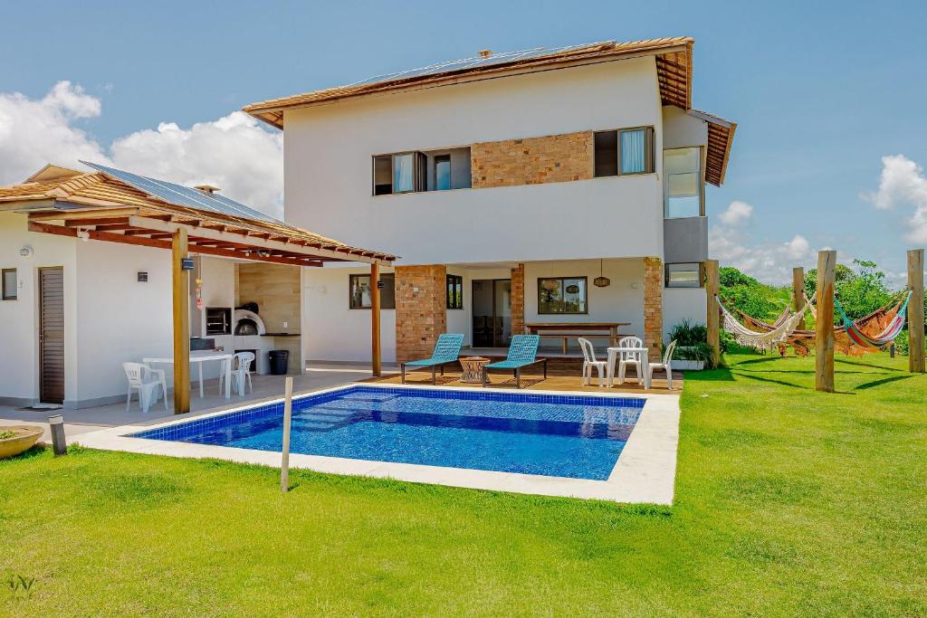 Πισίνα στο ή κοντά στο SA16 Excelente Casa 4 Suítes com Piscina - Sauípe