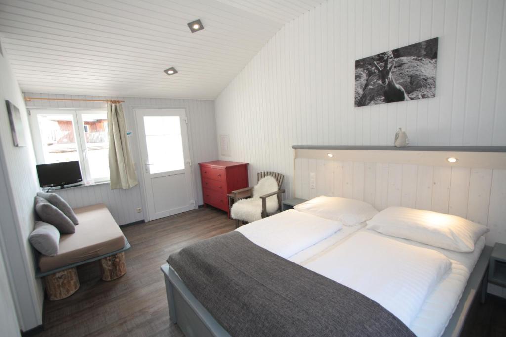 Postel nebo postele na pokoji v ubytování Ferienanlage Forellenhof