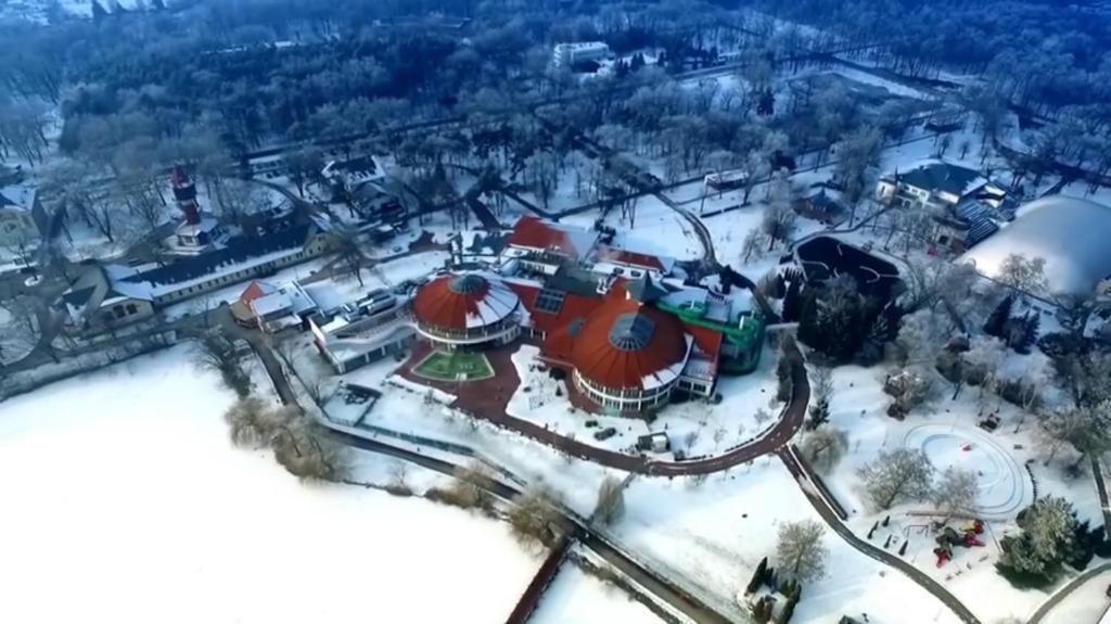 an aerial view of a amusement park covered in snow at Munkásszálló-Worker's House in Nyíregyháza