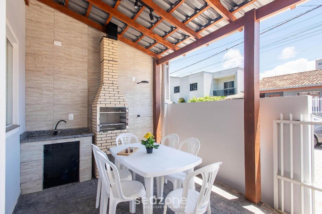 Кухня или мини-кухня в Casa 2Q c/ churrasq. 600m orla MCA0609
