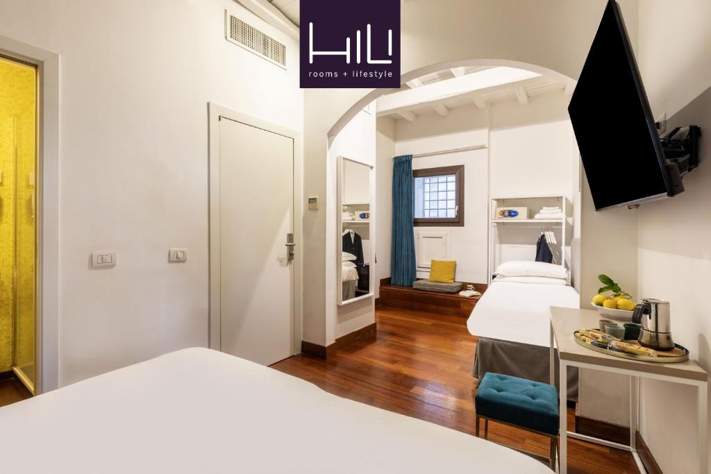 En eller flere senge i et værelse på Maison Giulia by Hili