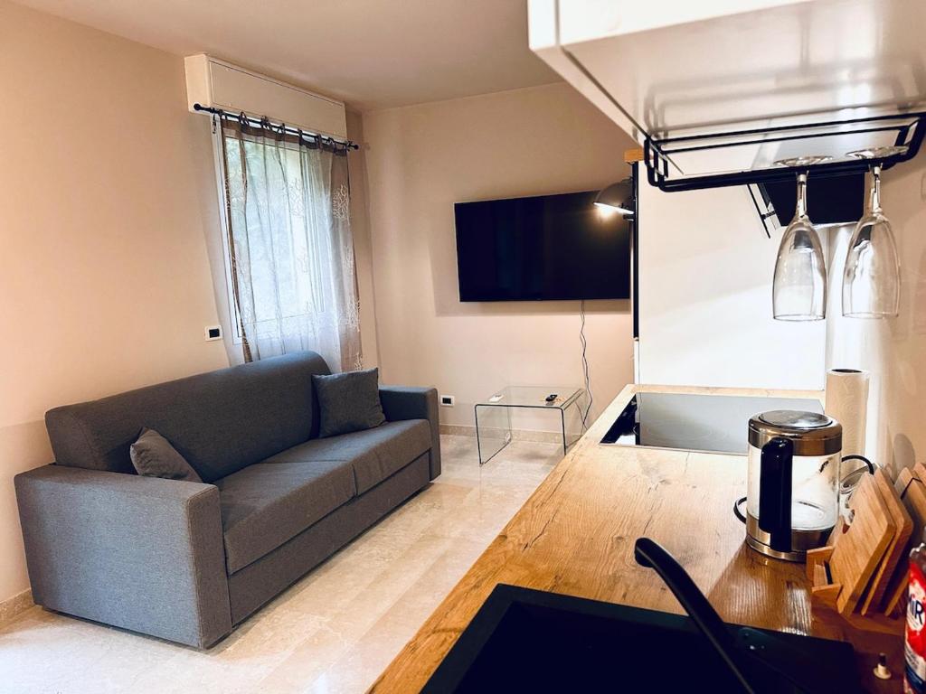 a living room with a couch and a table at Monte Carlo Vista in Beausoleil