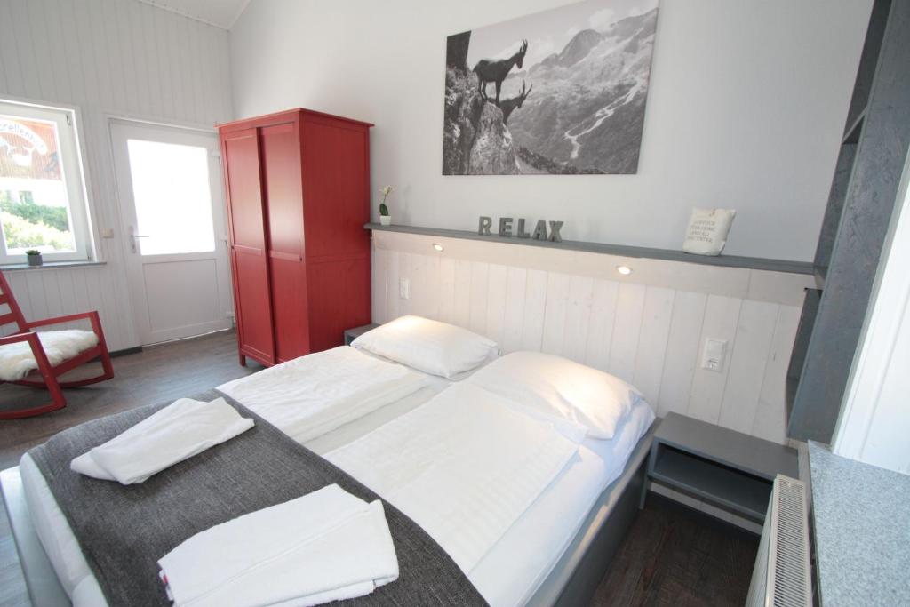 Postel nebo postele na pokoji v ubytování Ferienanlage Forellenhof