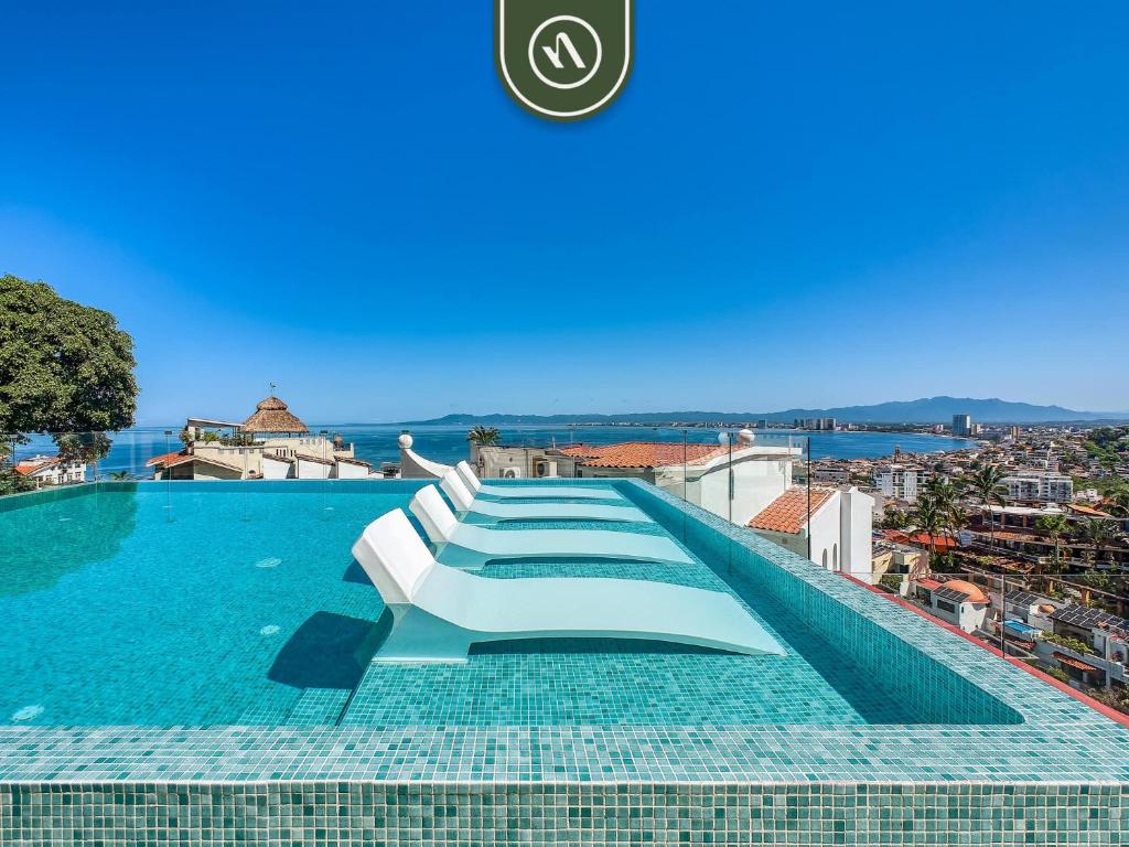 Πισίνα στο ή κοντά στο Luxury 2 BR Condo in the Jungle - Oceanview Pool