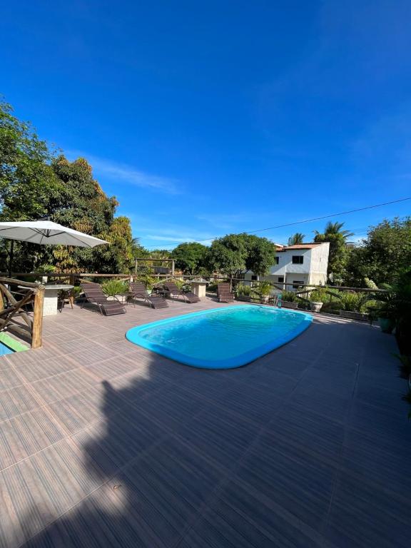 Swimmingpoolen hos eller tæt på Pousada Luar de Caraíva