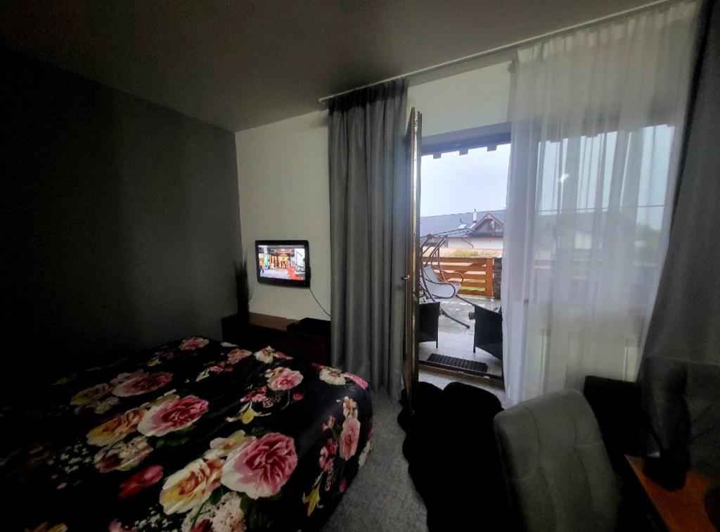 Μια τηλεόραση ή/και κέντρο ψυχαγωγίας στο Apartmán Andrea Tatragolf