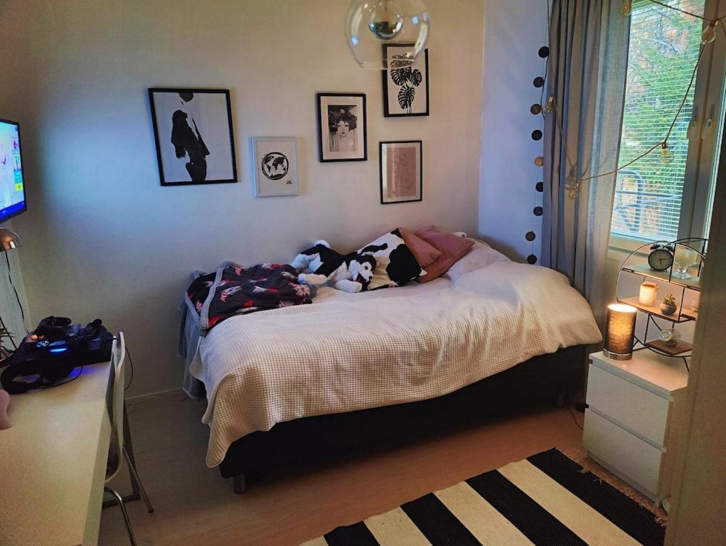 Ein Bett oder Betten in einem Zimmer der Unterkunft House santas