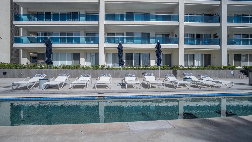 Bassein majutusasutuses Splash in The New Lazy River/Stay in Modern Luxury Encantame Viento 303 või selle lähedal