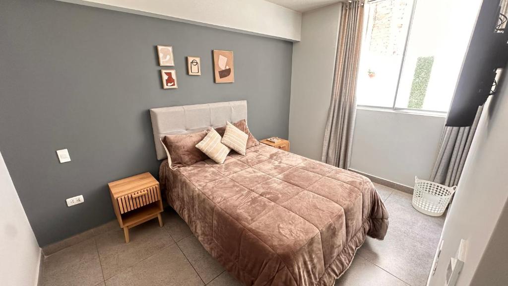 Ένα ή περισσότερα κρεβάτια σε δωμάτιο στο Arequipa Living Suites