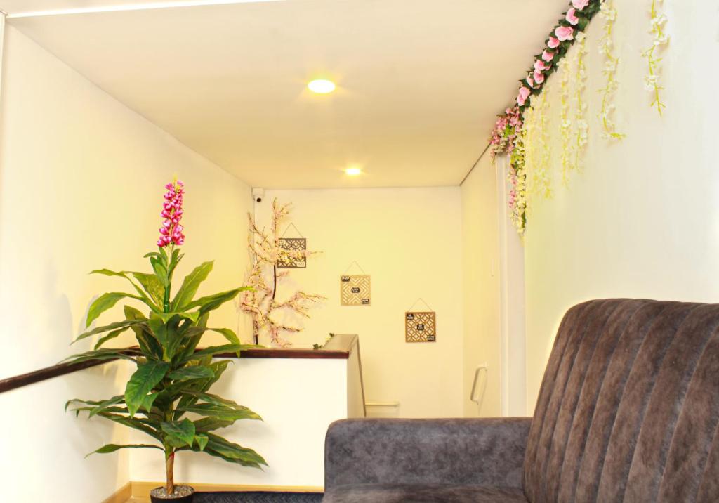 Χώρος καθιστικού στο Garden's Aparta hotel