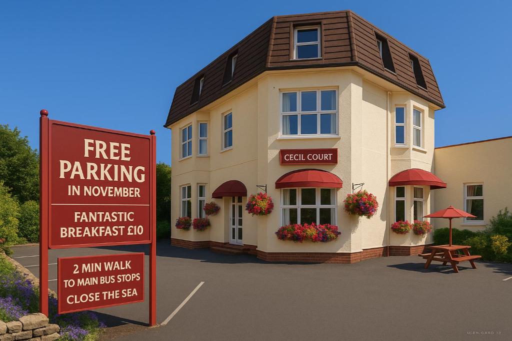 un panneau de stationnement gratuit en face d'un bâtiment dans l'établissement Cecil Court Hotel, à Bournemouth