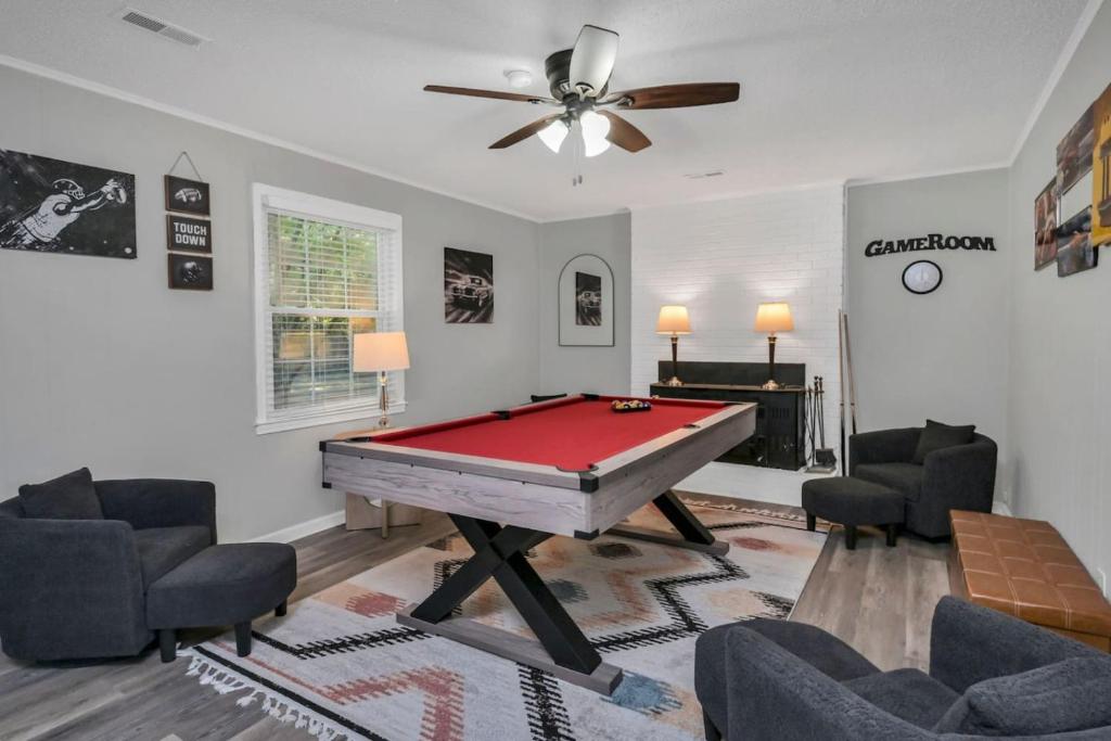 a living room with a pool table in it at Lexington Leisure House- 4BR in Lexington