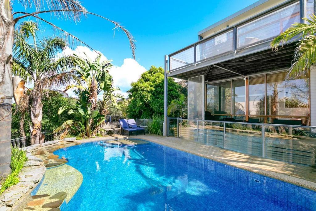 an image of a swimming pool in a house at Sunrise By The Sea in Torquay