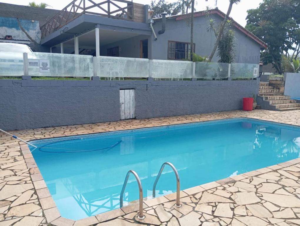 Πισίνα στο ή κοντά στο chacara paz no vale