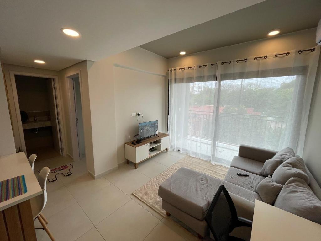 TV a/nebo společenská místnost v ubytování Washington Park Deptos