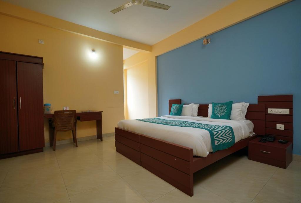 Postel nebo postele na pokoji v ubytování Hotel O Greenland