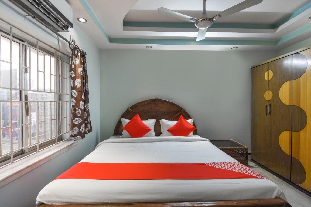 Ένα ή περισσότερα κρεβάτια σε δωμάτιο στο Hotel O Pinnacle Auberge