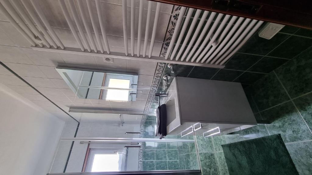 an overhead view of a room with a tv and windows at Retiro do Viajante in Penacova