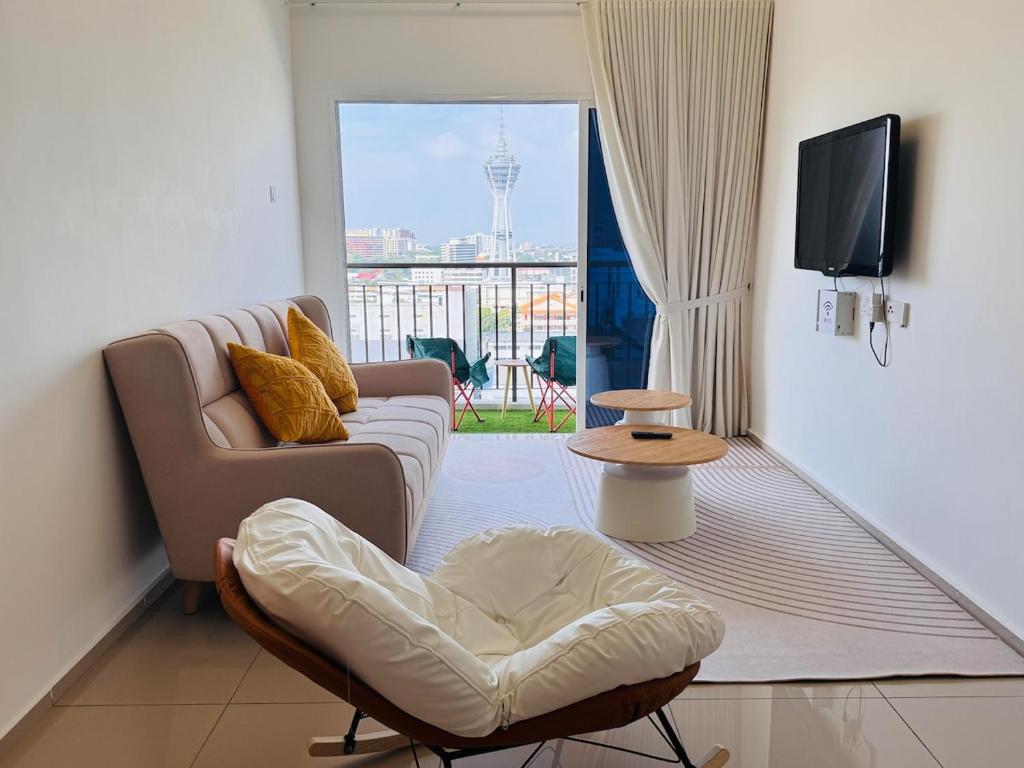 Μια τηλεόραση ή/και κέντρο ψυχαγωγίας στο homestay Alor Setar near Aman Centre-Condo Menara View by HogarFeliz