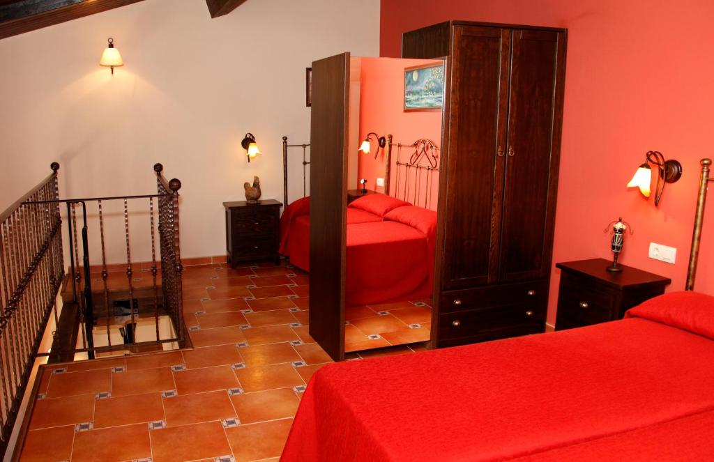 Postel nebo postele na pokoji v ubytování Finca El Encinar