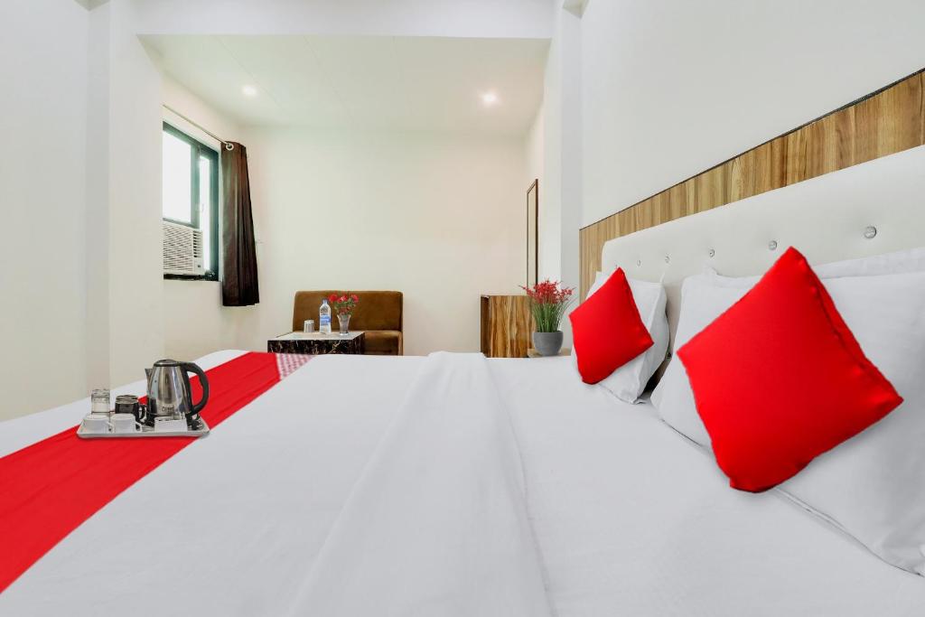 Ένα ή περισσότερα κρεβάτια σε δωμάτιο στο Hotel O LA PLAZO